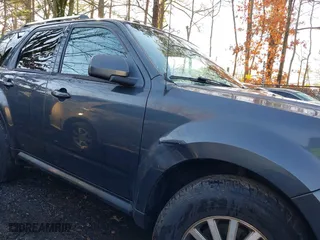2010 Mercury Mariner Premier with VIN 4M2CN8H78AKJ02824, listed as a IAAI auction lot 41533482 with 234,459 mi miles. Bid and sale history available at carsss.com. Image 6.