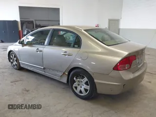 2006 Honda Civic LX z VIN 1HGFA16556L005459, wystawiony jako IAAI lot #41940768 z przebiegiem 178 595 mil mil oraz . Historia ofert i sprzedaży dostępna na DreamBid. Obrazek 3.