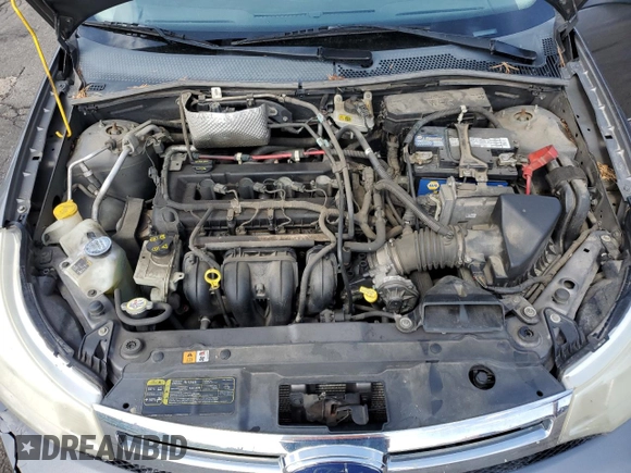 2009 Ford Focus SE z VIN 1FAHP35N89W175245, wystawiony jako Copart lot #55505205 z przebiegiem 125 645 mil mil oraz Szkoda całkowita • Salvage title. Historia ofert i sprzedaży dostępna na DreamBid. Obrazek 11.