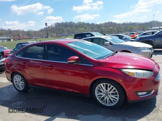 2015 Ford Focus Titanium with VIN 1FADP3J29FL230664, listed as a IAAI auction lot 41870083 with 125,578 mi miles and . Bid and sale history available at DreamBid. Image 13.
