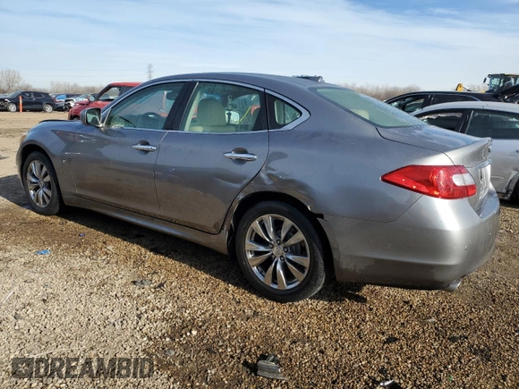 2014 Infiniti M37 with VIN JN1BY1AP2EM260051, listed as a Copart auction lot 87276884 with 101,899 mi miles and Salvage Title. Bid and sale history available at carsss.com. Image 2.