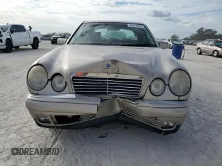 1999 Mercedes-Benz E-Class with VIN WDBJF82H9XX022535, listed as a Copart auction lot 86554534 with 140,904 mi miles and Salvage Title. Bid and sale history available at carsss.com. Image 5.