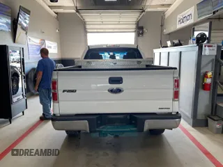 2014 Ford F-150 XL with VIN 1FTFX1EF5EFB70688, listed as a IAAI auction lot 42244439 with 182,779 mi miles and . Bid and sale history available at carsss.com. Image 1.
