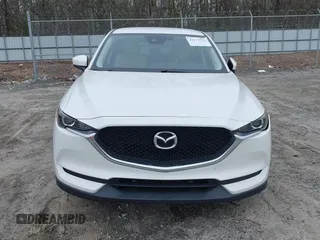 2017 Mazda CX-5 Touring with VIN JM3KFACL8H0205717, listed as a IAAI auction lot 41173725 with 107,604 mi miles. Bid and sale history available at carsss.com. Image 12.