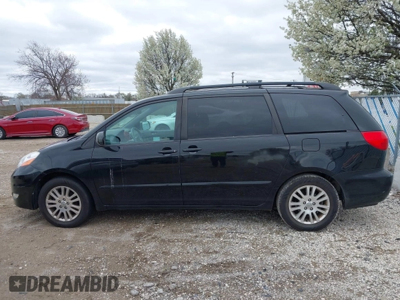 2010 Toyota Sienna XLE with VIN 5TDYK4CC1AS309856, listed as a IAAI auction lot 42089020 with 142,165 mi miles. Bid and sale history available at carsss.com. Image 14.