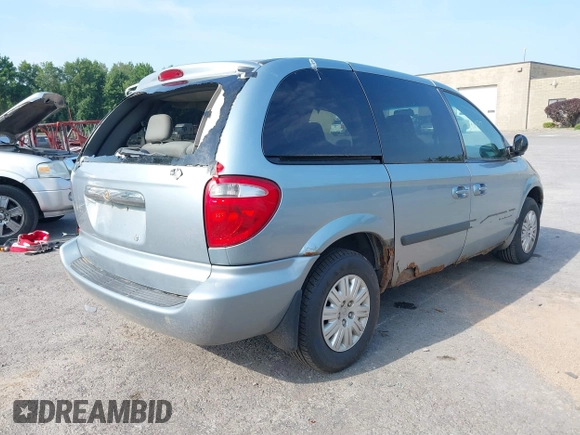 2005 Chrysler Town & Country with VIN 1C4GP45R35B326475, listed as a IAAI auction lot 40670759 with 199,230 mi miles. Bid and sale history available at carsss.com. Image 4.