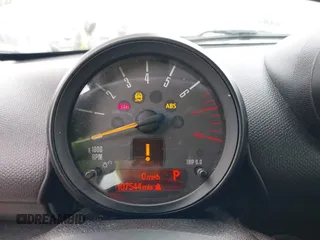 2015 MINI Countryman S z VIN WMWZC3C53FWT02232, wystawiony jako IAAI lot #42204694 z przebiegiem 107 544 mil mil oraz . Historia ofert i sprzedaży dostępna na DreamBid. Obrazek 7.