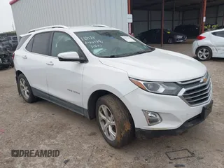 2018 Chevrolet Equinox Premier with VIN 3GNAXVEV9JL157359, listed as a IAAI auction lot 41937288 with 91,434 mi miles and . Bid and sale history available at DreamBid. Image 1.