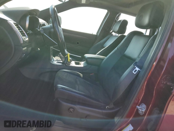 2020 Jeep Grand Cherokee Laredo E with VIN 1C4RJEAG2LC379633, listed as a Copart auction lot 58437555 with 57,219 mi miles and Salvage title. Bid and sale history available at DreamBid. Image 7.