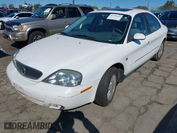 2004 Mercury Sable LS Premium z VIN 1MEHM55S64G610527, wystawiony jako IAAI lot #41739433 z przebiegiem 34 409 mil mil oraz . Historia ofert i sprzedaży dostępna na DreamBid. Obrazek 2.