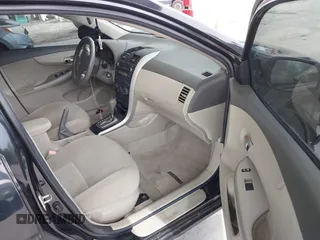2010 Toyota Corolla with VIN 1NXBU4EE4AZ195714, listed as a IAAI auction lot 42492709 with 158,609 mi miles and . Bid and sale history available at DreamBid. Image 5.
