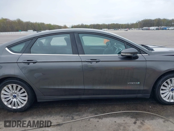2015 Ford Fusion SE Hybrid with VIN 3FA6P0LU9FR232583, listed as a IAAI auction lot 42012175 with 139,309 mi miles and . Bid and sale history available at DreamBid. Image 13.