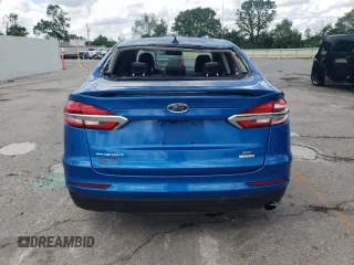 2020 Ford Fusion SE z VIN 3FA6P0HD9LR148574, wystawiony jako Copart lot #56694155 z przebiegiem 89 994 mil mil oraz Szkoda całkowita • Salvage title. Historia ofert i sprzedaży dostępna na DreamBid. Obrazek 6.