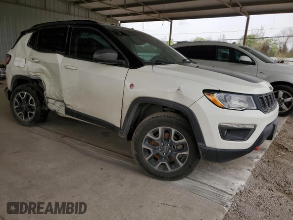 2019 Jeep Compass Trailhawk with VIN 3C4NJDDB9KT670934, listed as a Copart auction lot 48968305 with 101,129 mi miles and Clean Title. Bid and sale history available at carsss.com. Image 4.