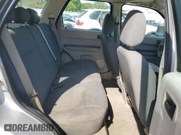 2008 Ford Escape XLS z VIN 1FMCU02ZX8KB15214, wystawiony jako Copart lot #53585195 z przebiegiem 241 310 mil mil oraz Szkoda całkowita • Salvage title. Historia ofert i sprzedaży dostępna na DreamBid. Obrazek 10.