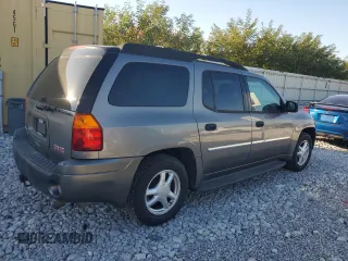 2006 GMC Envoy SLE with VIN 1GKET16S166171992, listed as a Copart auction lot 76676894 with 203,713 mi miles and Salvage Title. Bid and sale history available at DreamBid. Image 3.