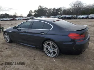 2013 BMW 6 Series 650i xDrive with VIN WBA6B4C57DDG67648, listed as a Copart auction lot 45528485 with 128,785 mi miles and Clean Title. Bid and sale history available at carsss.com. Image 2.