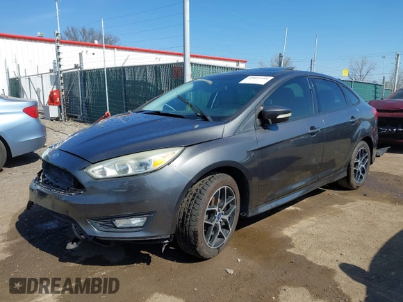 2015 Ford Focus SE with VIN 1FADP3F29FL268677, listed as a IAAI auction lot 42037244 with 118,018 mi miles. Bid and sale history available at carsss.com. Image 2.