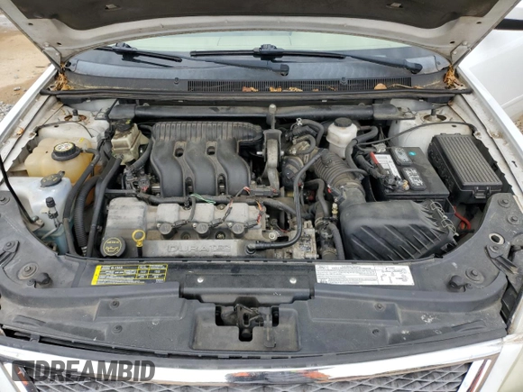 2005 Ford Five Hundred SE z VIN 1FAFP23155G171840, wystawiony jako Copart lot #54190685 z przebiegiem 147 383 mil mil oraz Szkoda całkowita • Salvage title. Historia ofert i sprzedaży dostępna na DreamBid. Obrazek 11.