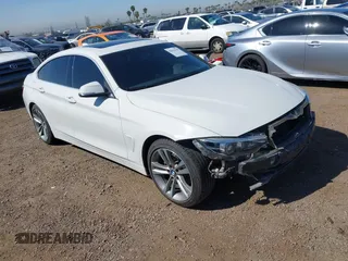 2019 BMW 4 Series 430i with VIN WBA4J1C54KBM18190, listed as a IAAI auction lot 42012759 with 73,598 mi miles. Bid and sale history available at carsss.com. Image 1.