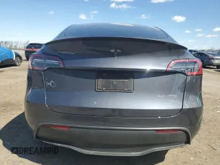 2023 Tesla Model Y Performance with VIN 7SAYGDEF3PF946496, listed as a Copart auction lot 50800315 with 15,077 mi miles and Salvage Title. Bid and sale history available at DreamBid. Image 6.