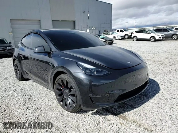 2024 Tesla Model Y Performance z VIN 7SAYGDEF6RF166365, wystawiony jako Copart lot #48885585 z przebiegiem Nie podano mil oraz Szkoda całkowita • Salvage title. Historia ofert i sprzedaży dostępna na DreamBid. Obrazek 11.