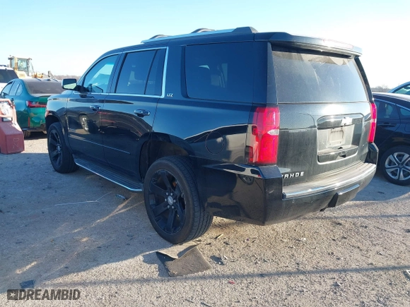 2016 Chevrolet Tahoe LTZ with VIN 1GNSKCKC1GR381785, listed as a IAAI auction lot 41376945 with 120,279 mi miles. Bid and sale history available at carsss.com. Image 3.