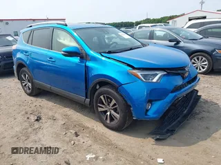 2018 Toyota RAV4 XLE with VIN JTMWFREV5JJ181366, listed as a IAAI auction lot 42412002 with 145,948 mi miles and . Bid and sale history available at DreamBid. Image 1.