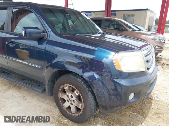 2011 Honda Pilot Touring z VIN 5FNYF3H94BB032105, wystawiony jako IAAI lot #42435522 z przebiegiem 247 899 mil mil oraz . Historia ofert i sprzedaży dostępna na DreamBid. Obrazek 6.