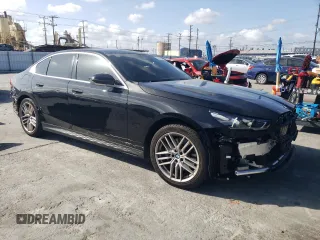 2024 BMW 5 Series 530i with VIN WBA43FJ08RCP78906, listed as a Copart auction lot 50730475 with 29,442 mi miles and Salvage title. Bid and sale history available at DreamBid. Image 4.