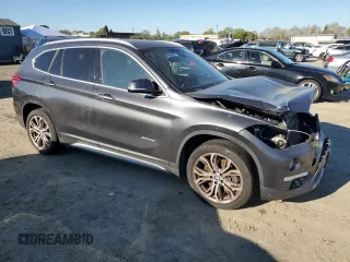 2017 BMW X1 sDrive28i with VIN WBXHU7C3XH5H36874, listed as a Copart auction lot 50607235 with 100,458 mi miles and Clean Title. Bid and sale history available at carsss.com. Image 4.