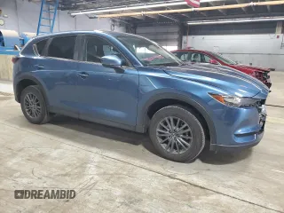 2020 Mazda CX-5 Touring z VIN JM3KFBCM7L0855159, wystawiony jako Copart lot #53161635 z przebiegiem 39 154 mil mil oraz Szkoda całkowita • Salvage title. Historia ofert i sprzedaży dostępna na DreamBid. Obrazek 4.