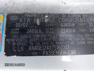 2007 Kia Optima EX with VIN KNAGE124375162317, listed as a IAAI auction lot 41246445 with 174,128 mi miles. Bid and sale history available at carsss.com. Image 9.