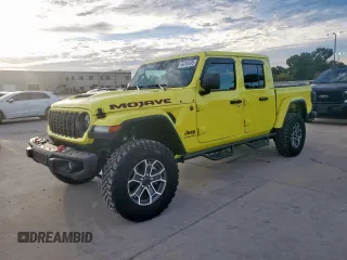 2024 Jeep Gladiator Mojave with VIN 1C6JJTEG8RL104585, listed as a Copart auction lot 66293495 with 7,528 mi miles and Salvage title. Bid and sale history available at DreamBid. Image 1.