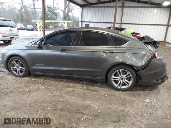 2015 Ford Fusion SE Hybrid with VIN 3FA6P0LU6FR248904, listed as a IAAI auction lot 41556607 with 224,799 mi miles. Bid and sale history available at carsss.com. Image 14.