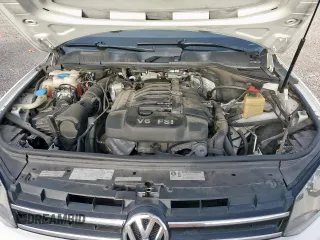 2012 Volkswagen Touareg Sport z VIN WVGEF9BP4CD007058, wystawiony jako Copart lot #56971745 z przebiegiem 181 221 mil mil oraz Czysty tytuł • Clean title. Historia ofert i sprzedaży dostępna na DreamBid. Obrazek 11.