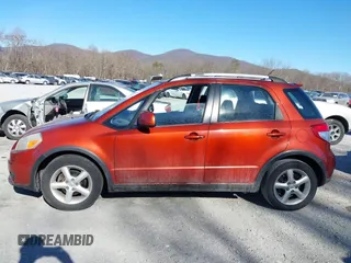 2009 Suzuki SX4 Touring AWD with VIN JS2YB417595100925, listed as a IAAI auction lot 41693882 with 76,972 mi miles and . Bid and sale history available at DreamBid. Image 15.