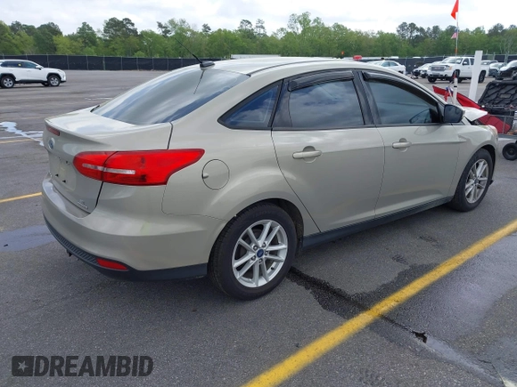2016 Ford Focus SE with VIN 1FADP3F23GL350387, listed as a IAAI auction lot 41948782 with 70,188 mi miles. Bid and sale history available at carsss.com. Image 4.