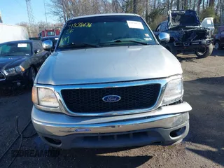 2002 Ford F-150 XL with VIN 1FTRF17242NA48027, listed as a IAAI auction lot 41838636 with 69,821 mi miles. Bid and sale history available at carsss.com. Image 12.