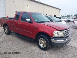 2000 Ford F-150 XL with VIN 1FTZX1722YNB37228, listed as a IAAI auction lot 42241027 with Not provided miles and . Bid and sale history available at DreamBid. Image 1.