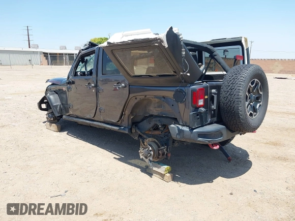 2016 Jeep Wrangler Unlimited Rubicon with VIN 1C4BJWFG7GL274673, listed as a IAAI auction lot 42532134 with 166,661 mi miles and . Bid and sale history available at DreamBid. Image 3.