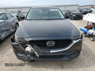 2021 Mazda CX-5 Grand Touring with VIN JM3KFBDM6M0401517, listed as a Copart auction lot 51019645 with 55,906 mi miles and Salvage Title. Bid and sale history available at DreamBid. Image 5.