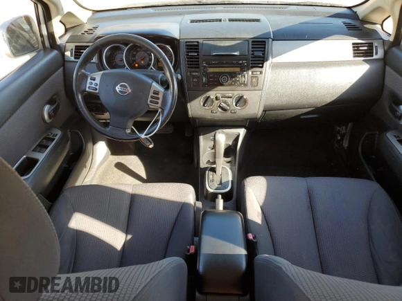 2009 Nissan Versa 1.8 SL with VIN 3N1BC13E39L409285, listed as a Copart auction lot 48911594 with 182,041 mi miles and Salvage Title. Bid and sale history available at carsss.com. Image 8.