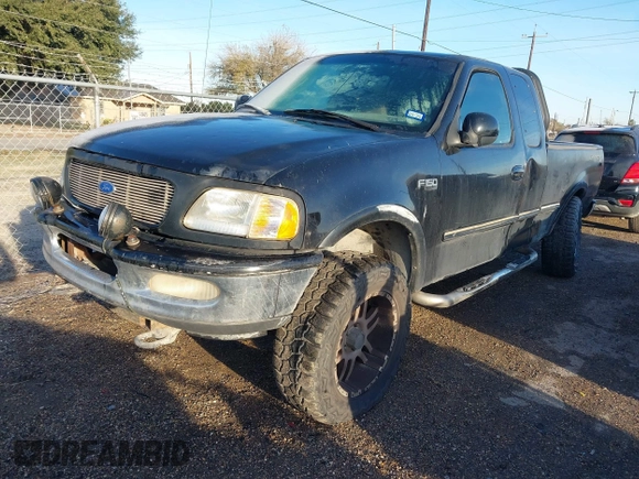 1997 Ford F-150 XL with VIN 1FTDX18W1VNB21383, listed as a IAAI auction lot 41378608 with 155,453 mi miles. Bid and sale history available at carsss.com. Image 2.