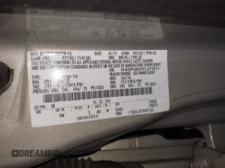 2015 Ford Focus SE with VIN 1FADP3K21FL211511, listed as a IAAI auction lot 42153828 with 126,111 mi miles. Bid and sale history available at carsss.com. Image 9.