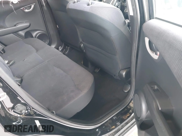 2013 Honda Fit Sport с VIN JHMGE8H59DC042068, выставлен на аукционе IAAI как лот 41803884 с пробегом 128 223 миль миль и . История ставок и продаж доступна на DreamBid. Изображение 8.