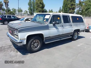 1990 GMC Suburban with VIN 1GKGR26NXLF528203, listed as a IAAI auction lot 42731684 with 185,736 mi miles and . Bid and sale history available at DreamBid. Image 6.
