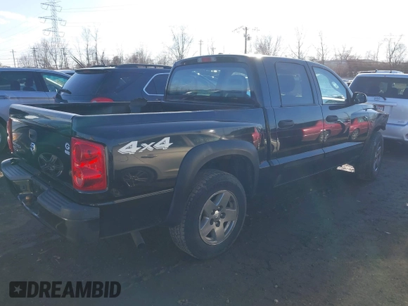 2006 Dodge Dakota SLT z VIN 1D7HW48K66S632826, wystawiony jako IAAI lot #41635407 z przebiegiem 208 046 mil mil oraz . Historia ofert i sprzedaży dostępna na DreamBid. Obrazek 4.