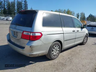 2006 Honda Odyssey LX with VIN 5FNRL38236B127129, listed as a IAAI auction lot 42041994 with 282,313 mi miles. Bid and sale history available at carsss.com. Image 4.
