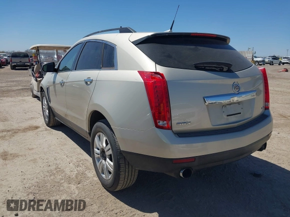 2013 Cadillac SRX z VIN 3GYFNAE33DS654844, wystawiony jako IAAI lot #41765013 z przebiegiem 117 616 mil mil oraz . Historia ofert i sprzedaży dostępna na DreamBid. Obrazek 3.